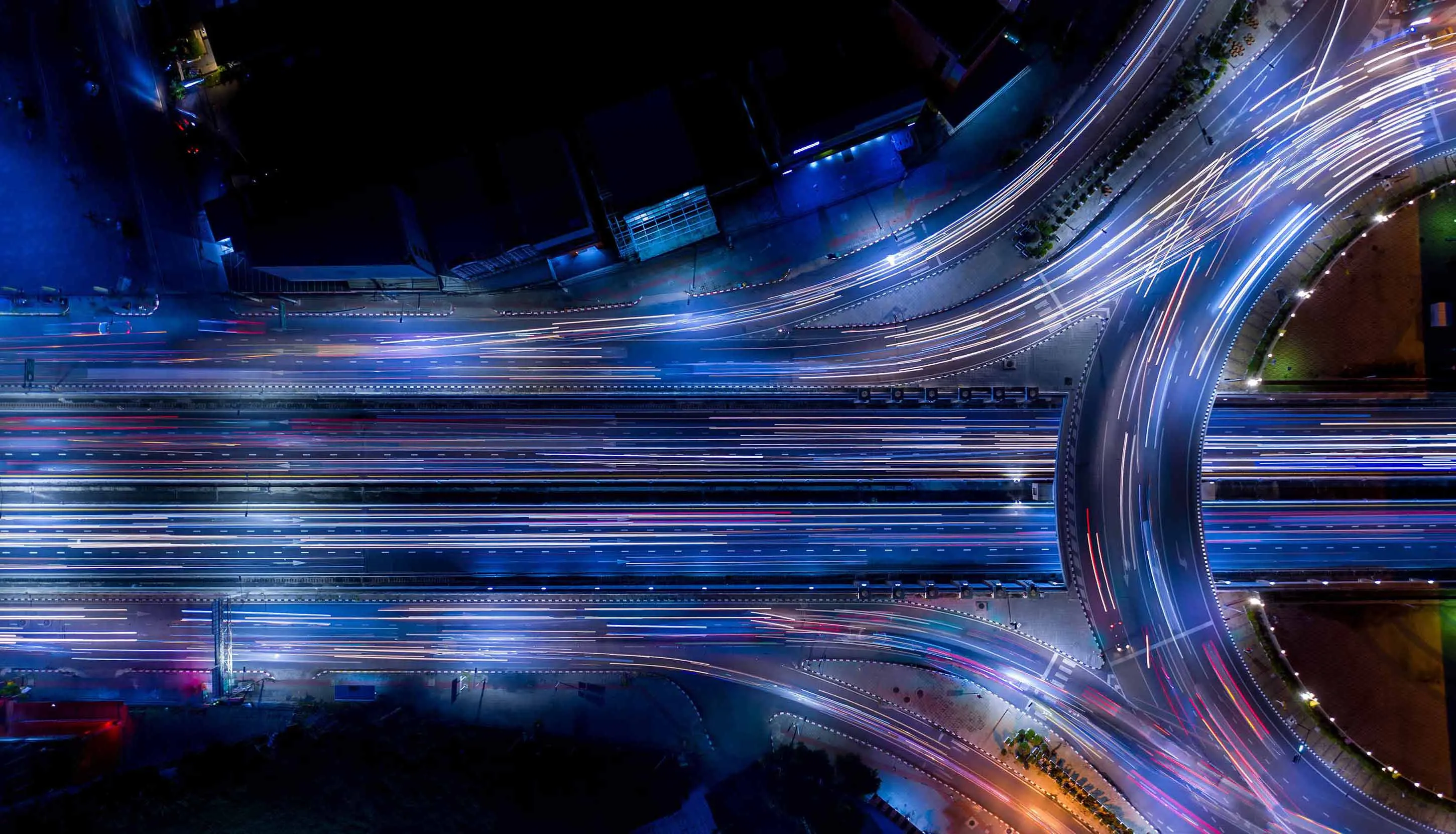 Aerial top view of a motorway at night.